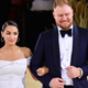 Alexandria Ocasio-Cortez and Riley Roberts leave the 2021 Met Gala Celebrating In America: A Lexicon Of Fashion at Metropolitan Museum of Art on September 13, 2021 in New York City